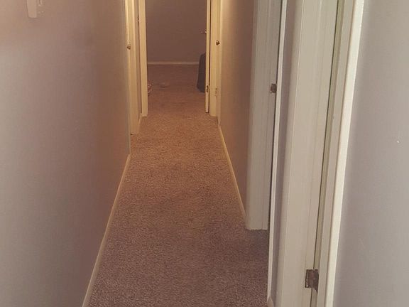 Hall to laundry & bedrooms 