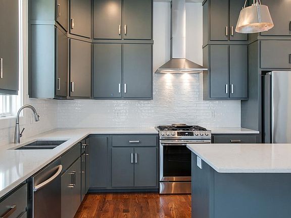 LOTS of cabinet space. All soft close drawers and cabinets. Gas range. Stainless steel appliances. Subway backsplash. (Not pictured is separate pantry)