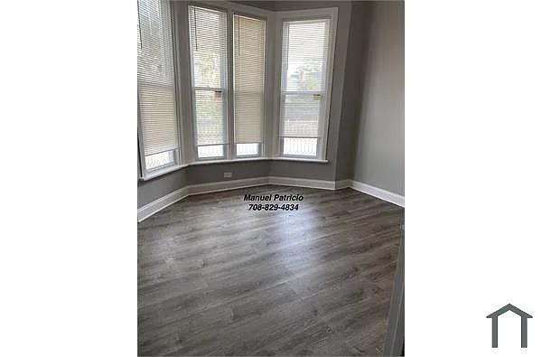 Building Photo - 6606 S Evans Ave #1