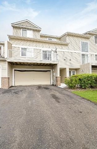 Welcome to easy townhome living at 11223 77th St NE, Otsego.