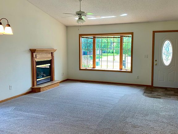 Living Room with closet for guests coming in the front door. Living Room is off of the Dining Room.