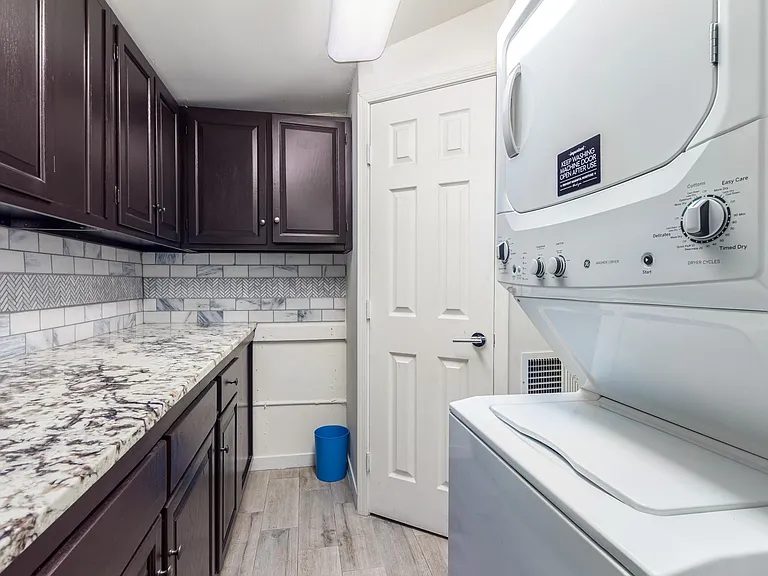 Laundry Room with lots of cabinet storage space.
