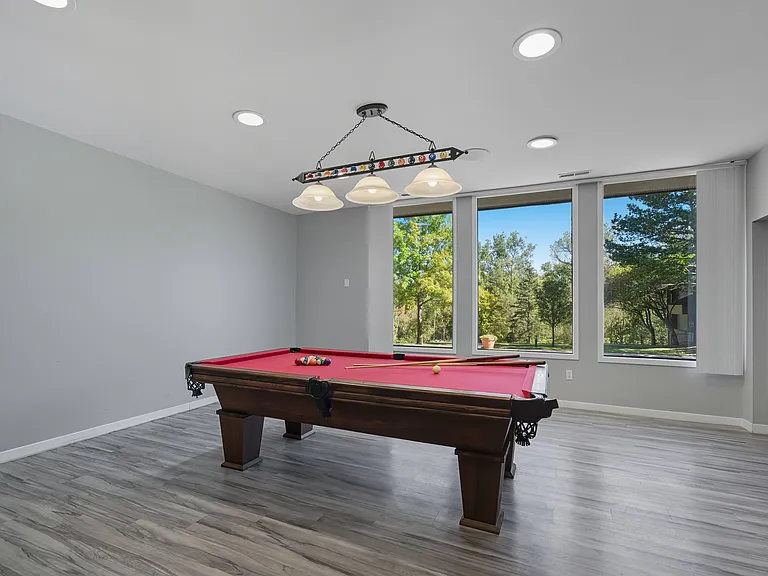 Billiards room at Franklin River Apartments in Southfield