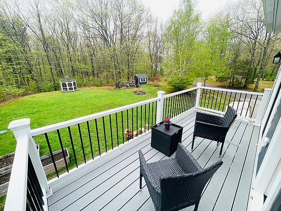 Deck with bistro chairs and table