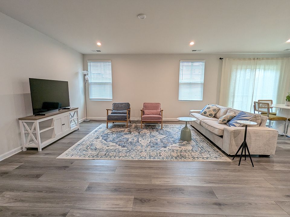 Spacious open living area (staged)