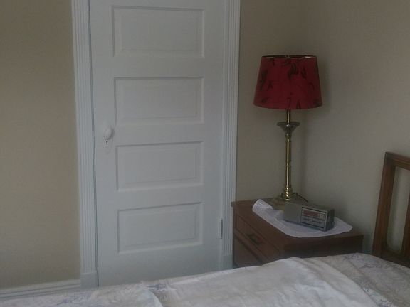 red lamp by closet door