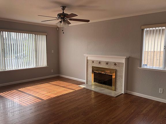 Spacious Living rm with lots of light.