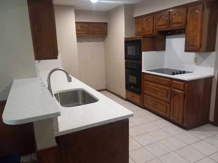 new quartz kitchen counter top with full quartz backsplash, new single bowl stainless steel sink