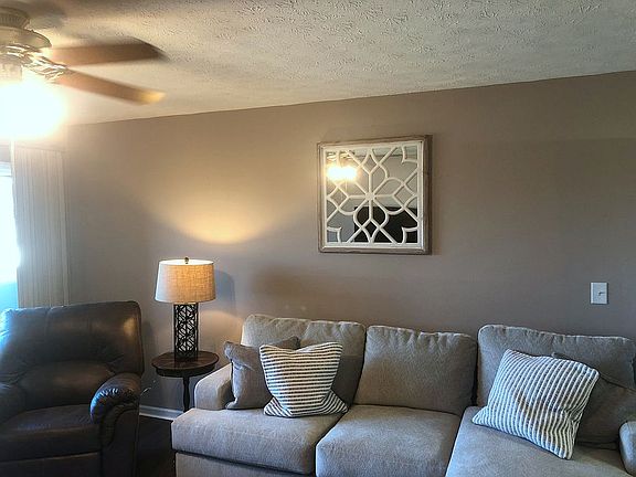 Living room w/ furniture.