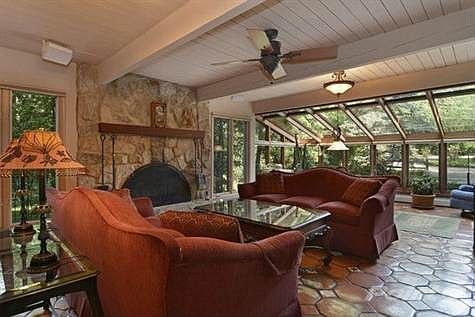 Fabulous Family Room w/fireplace, wetbar and windows surround