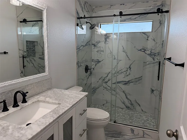 Another view of the bathroom and gorgeous shower.