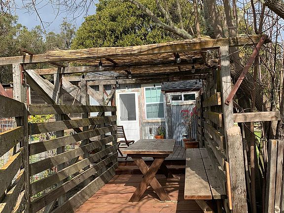 The outdoor seating/dining area for the Milk House. This was the original cow scale, the scale is still there intact, under the decking.