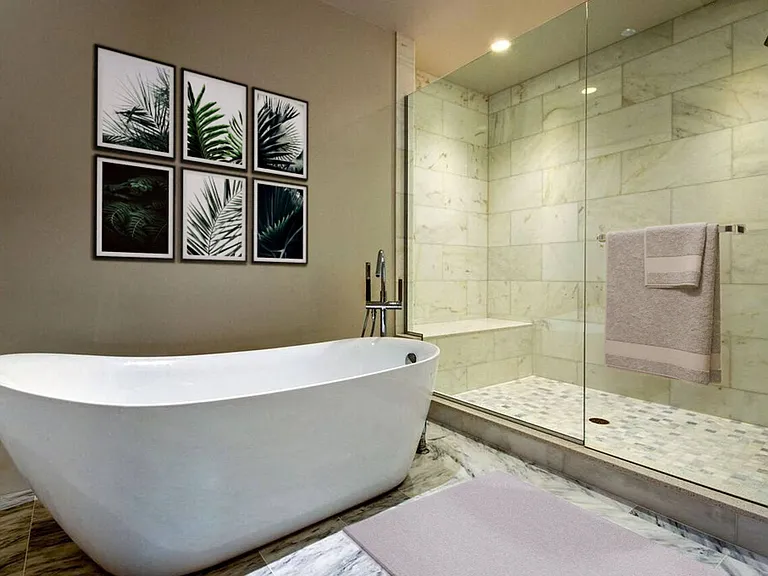 Expansive bathrooms with a soaking tub and rain shower combination
