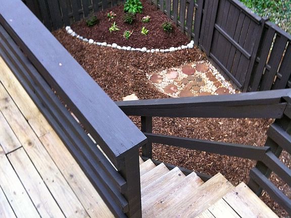 Deck overlooking backyard