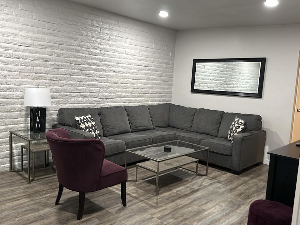 Spacious living room with large couch for the family