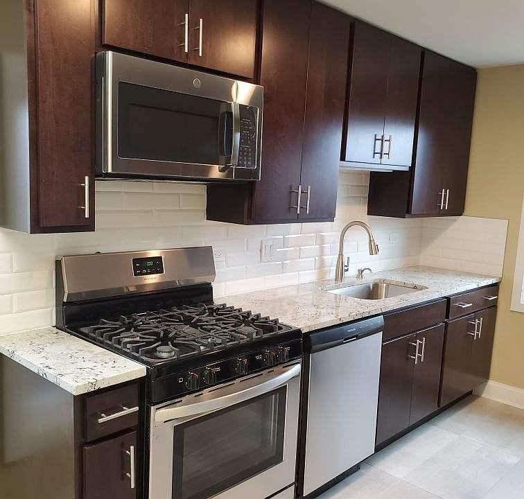 Beautifully renovated kitchen, brand new appliances, granite countertops