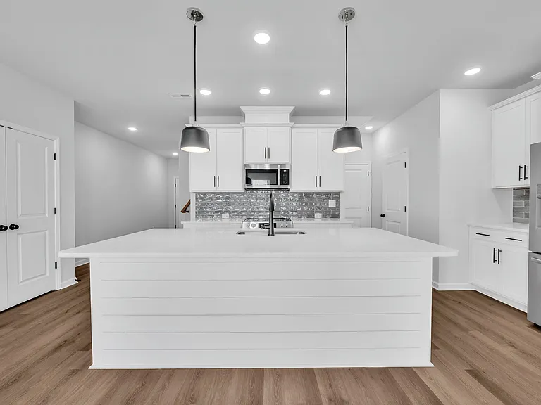 Kitchen view with breakfast bar.