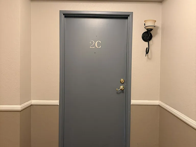 Unit entry for 2C with interior hallway access.