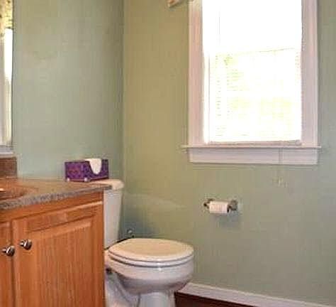 1st floor half bath with washer and dryer.