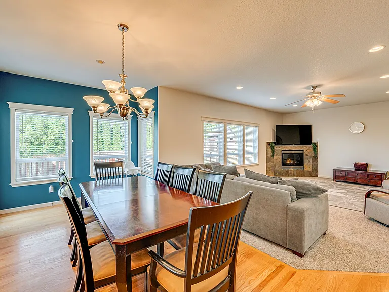 Left to the kitchen, left and ahead to the back deck, right to the downstairs half bath, garage, or office