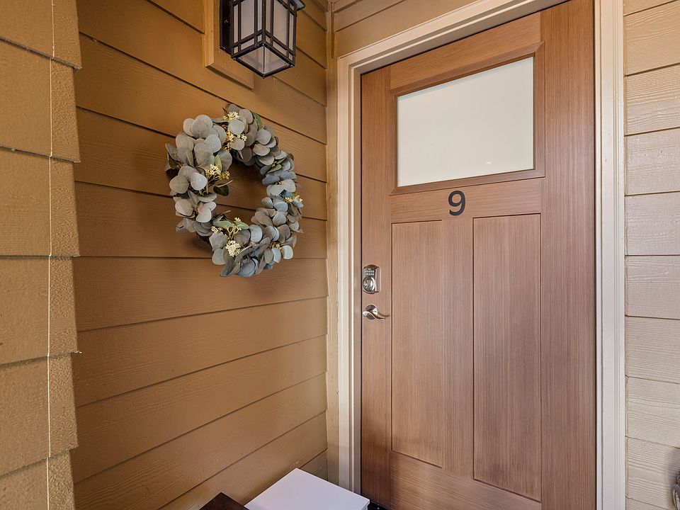Beautiful front door with privacy window. Your new entrance into a cozy haven.