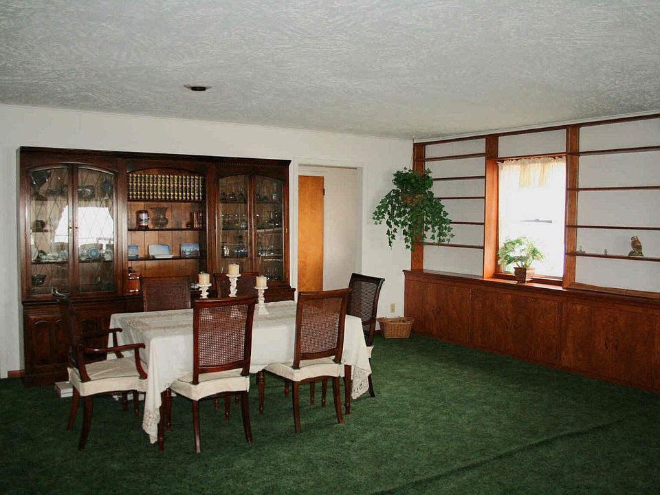 Dining room  Both of these huge rooms overlook the lake.
