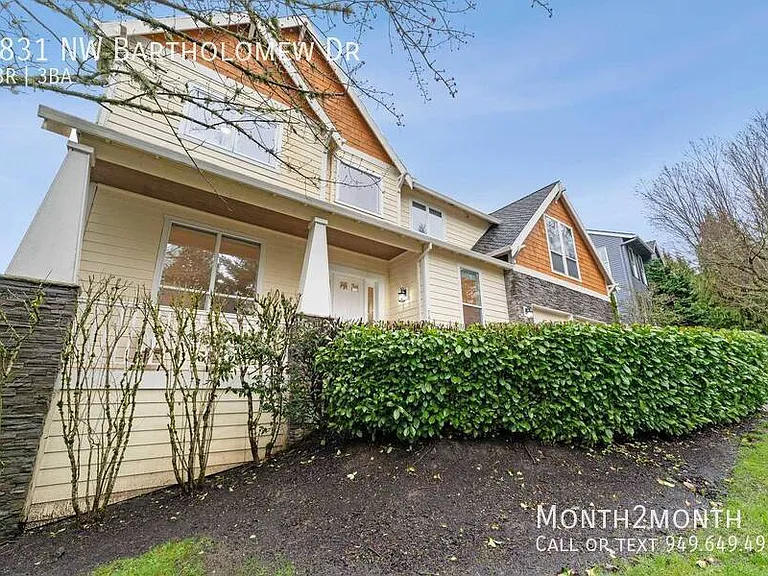 9831 NW Bartholomew Dr — Photo 34