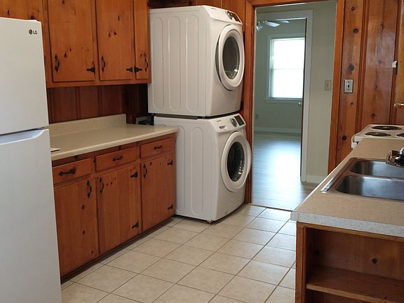 Full size washer and dryer in kitchen