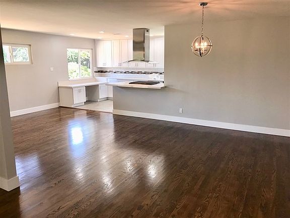 HUGE living room combined with Dining Room that opens to Kitchen providing a Great Room expansiveness.