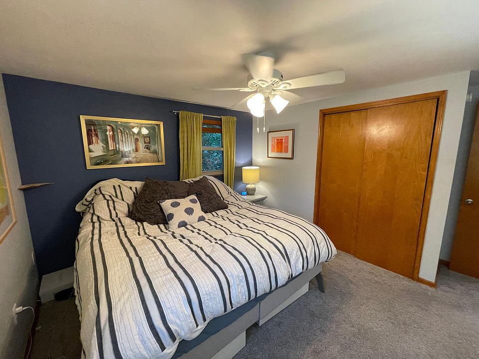 Master bedroom, new ceiling fan and good sized windows for morning sun.
