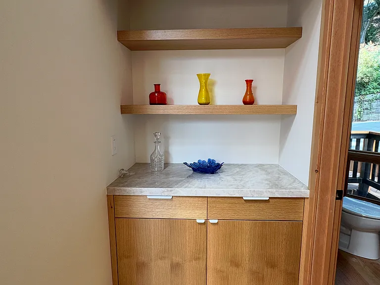 Small cabinet and shelves; internet adapter outlets in drawer