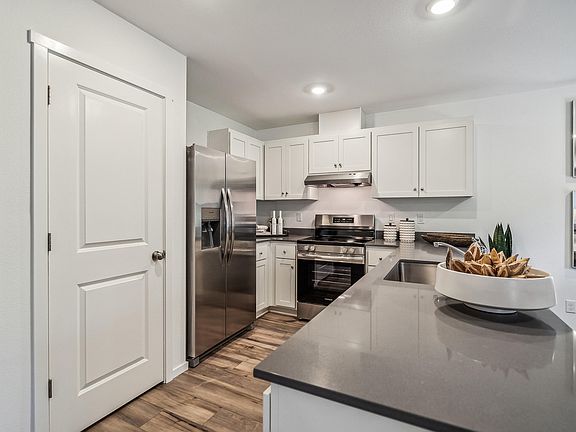 5th image of 1036 NE Cobblestone Ct
