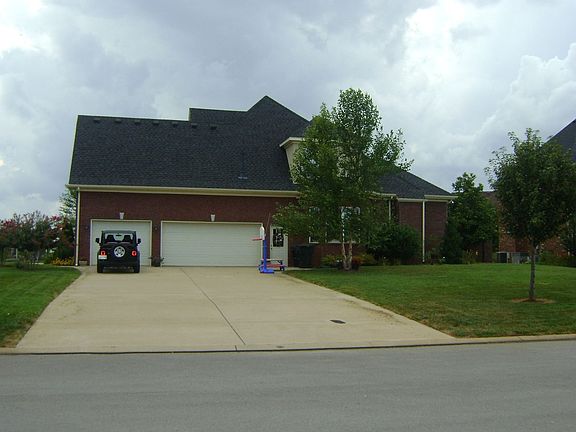 Side View - 3 car garage - double driveway
