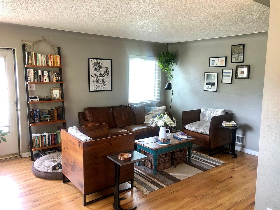 Roomy living room on end unit with plenty of natural light