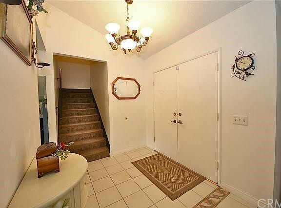 Tile flooring, vaulted ceiling