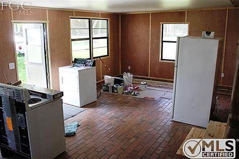 ..Landlord wasn't quite finished..he is moving these appliances out of the Living room..