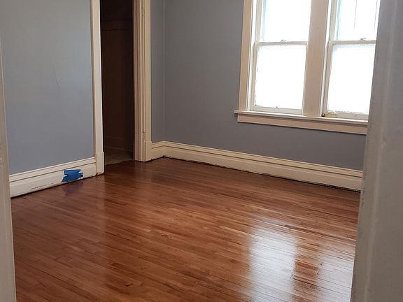 Bedroom #2: Floors completely refinished and fresh paint.
