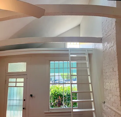 This is a closeup of ladder leading to the loft.