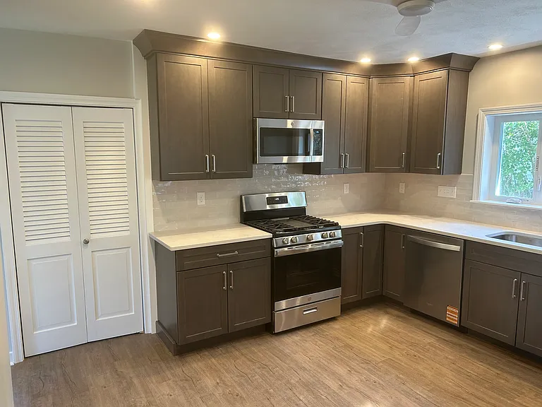 Brand New Cabinetry and Full Sized Pantry for Storage.
