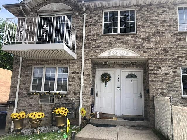 Front entrance of home and apartments.