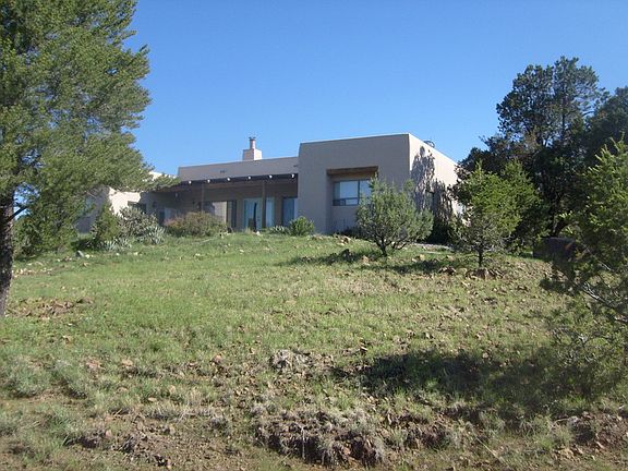 Home on the Hill : Looking UP at the South side of the house. Check out the views looking DOWN !!