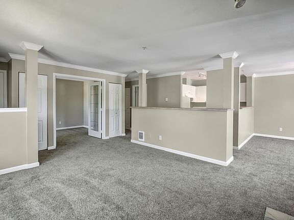 Living room towards 1st bed/den & kitchen