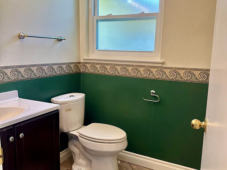 Half a bath near the kitchen