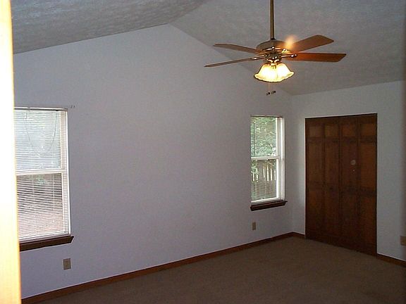 The Master BR is HUGE. Vaulted ceilings, ceiling fan with light, and His/Hers closets. Plenty of room for your King size furniture.