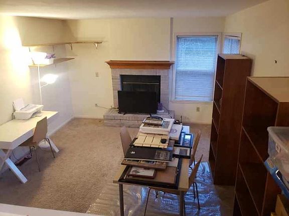 Lower level family room, gas fireplace.