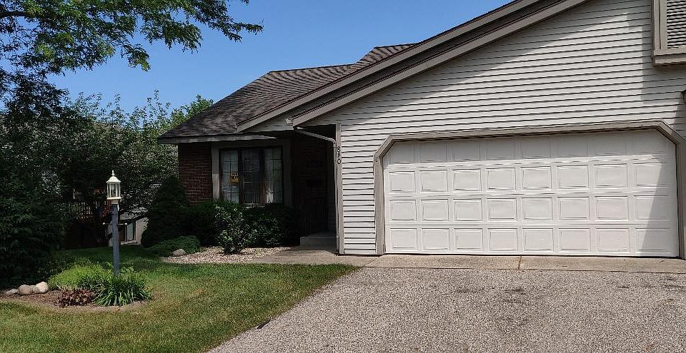 Front with 2 stall garage w/utility closet