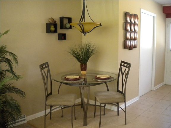 Eat in Kitchen, Ceramic Tile, and Updated Lighting.  