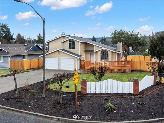 Perfectly situated on a large corner lot, this fenced home offers large refinished deck for entertaining