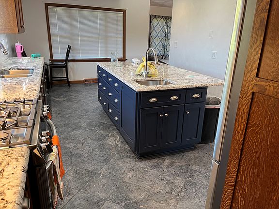New kitchen, highlighting the island with second sink. All new stainless steel appliances.