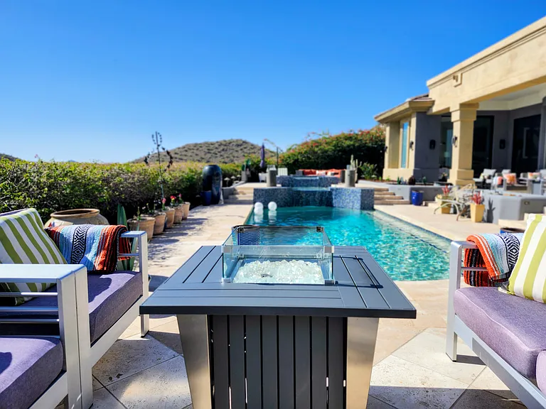Just outside the family room is a sunny patio with 360 views